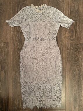 Woman’s light blue dress